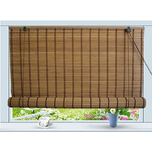 Natural bamboo blinds hanging in a home interior